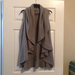 One size fits all, sleeveless sweater wrap